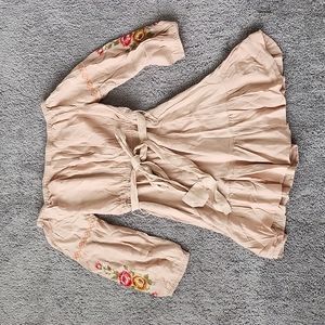 Blush pink Off the shoulder dress with embroidered floral detail.